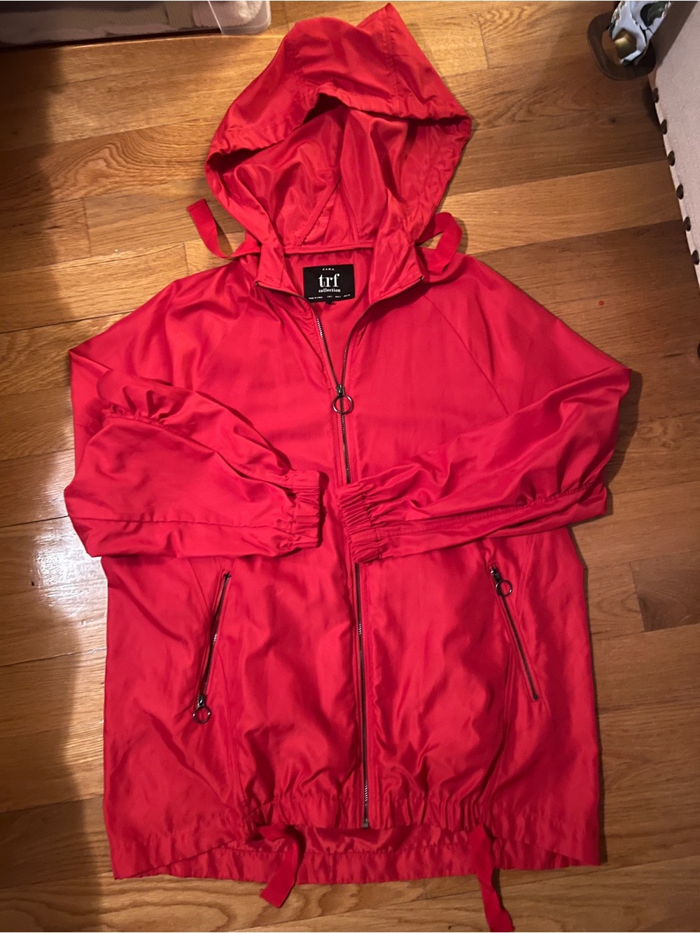 Zara Red Hooded Windbreaker Jacket folds into pouch